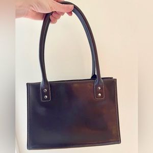 Vintage Y2K brow leather mini bag by Wilson’s